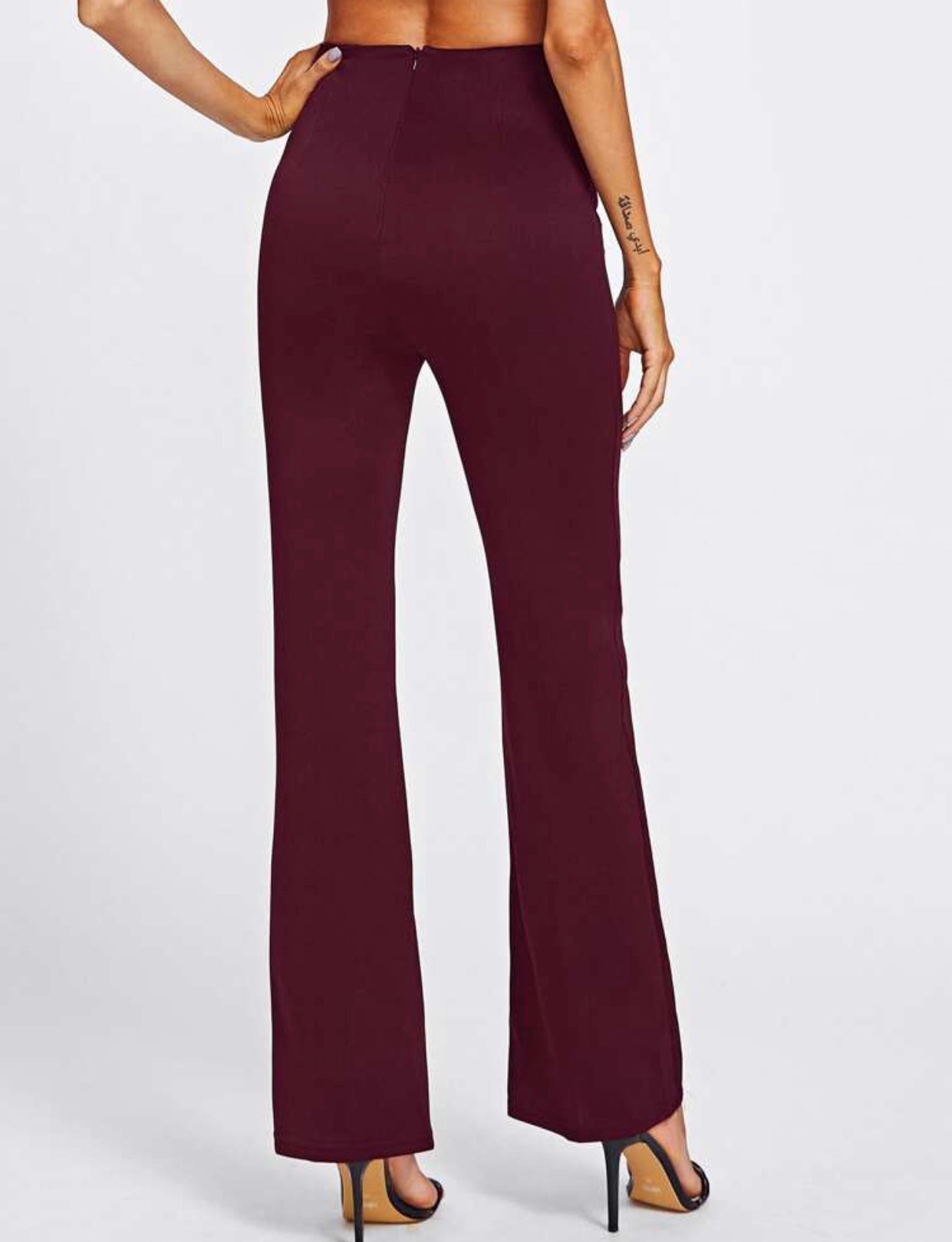 Pantalon taille haute avec double rangée de boutons