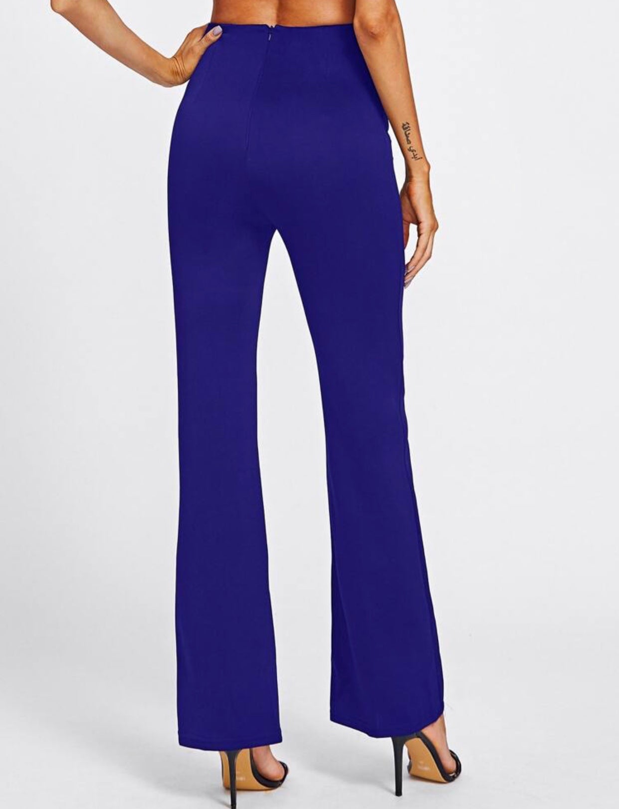 Pantalon taille haute avec double rangée de boutons