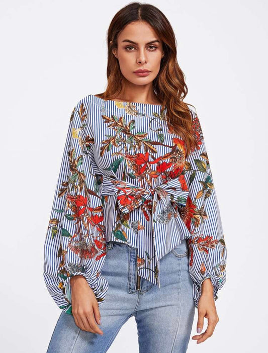 Blouse avec ceinture et manches lanterne